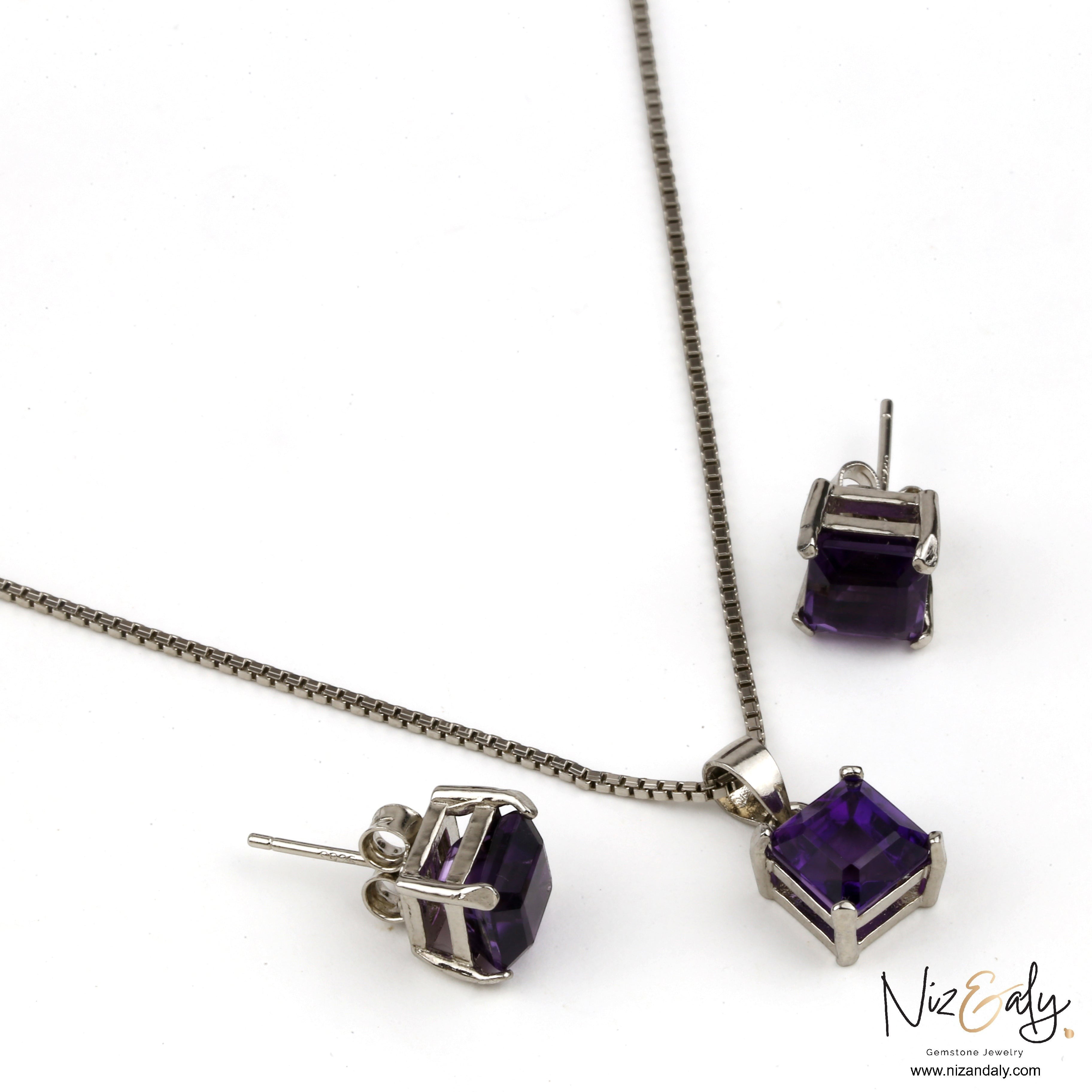 Niz & Aly square-cut amethyst pendant and matching stud earrings set in silver, featuring deep purple faceted stones.