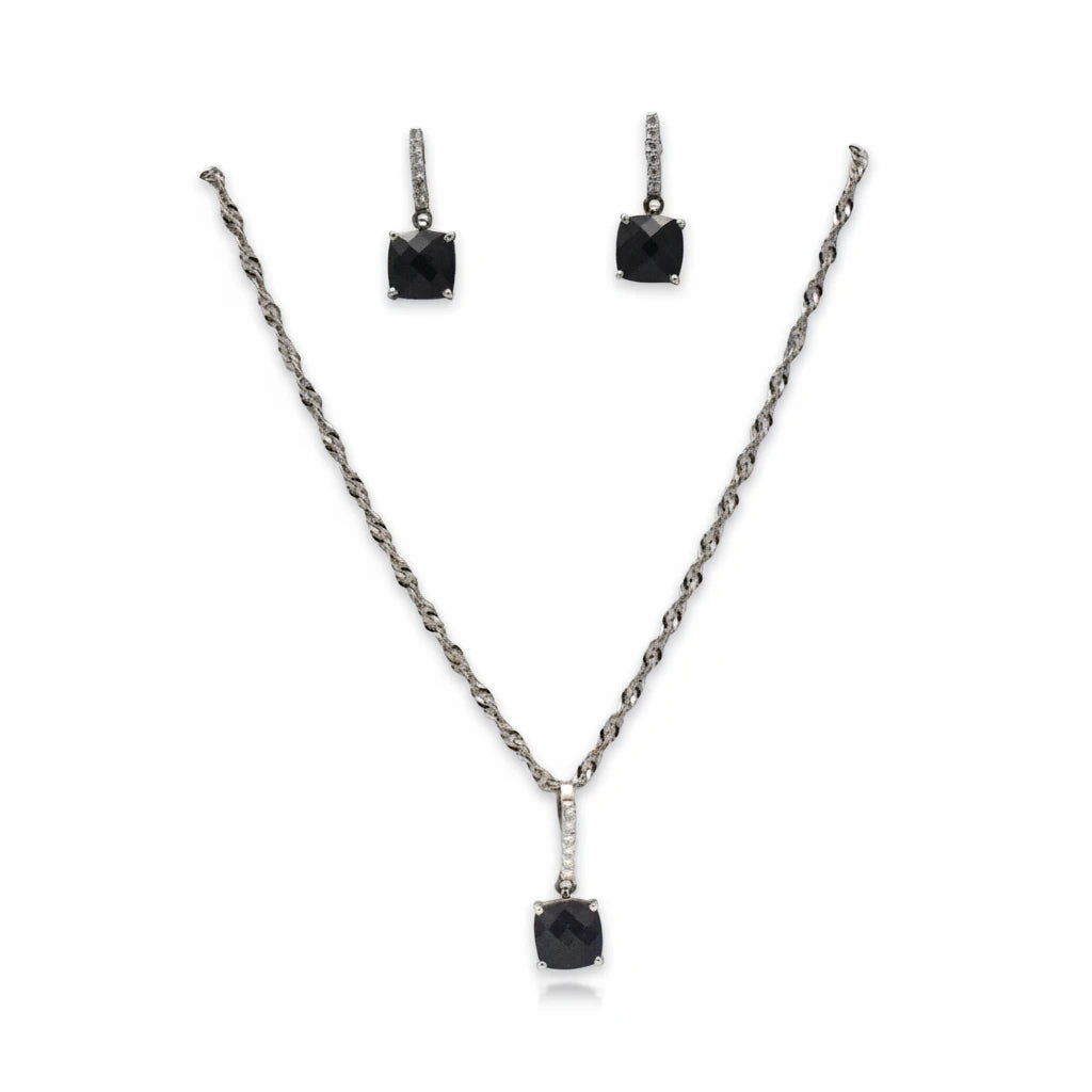 Niz & Aly square black onyx pendant and earring set featuring faceted stones on a twisted silver chain.
