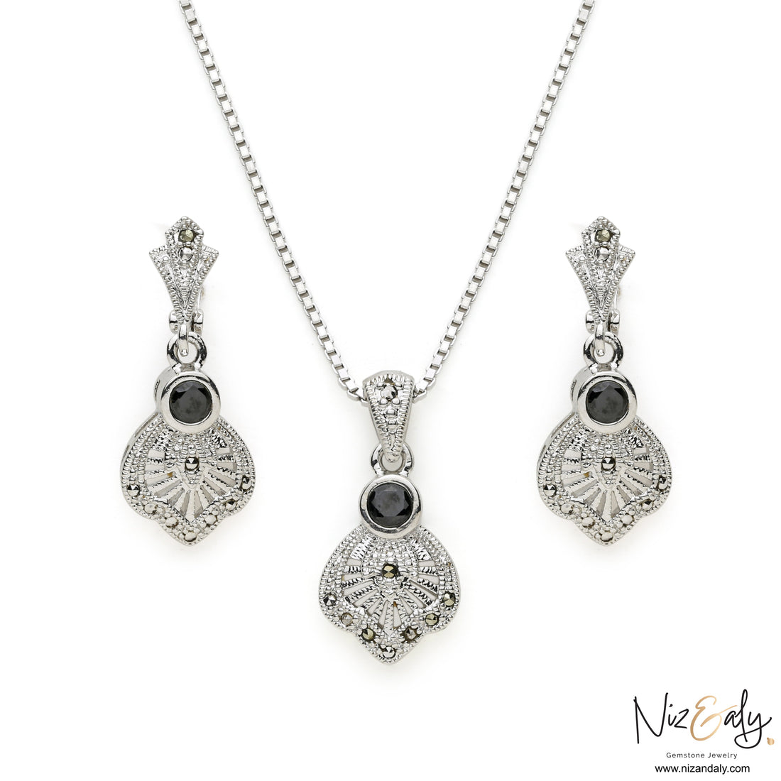 Niz & Aly sterling silver jewelry set featuring black agate pendants and earrings with vintage star motif details.