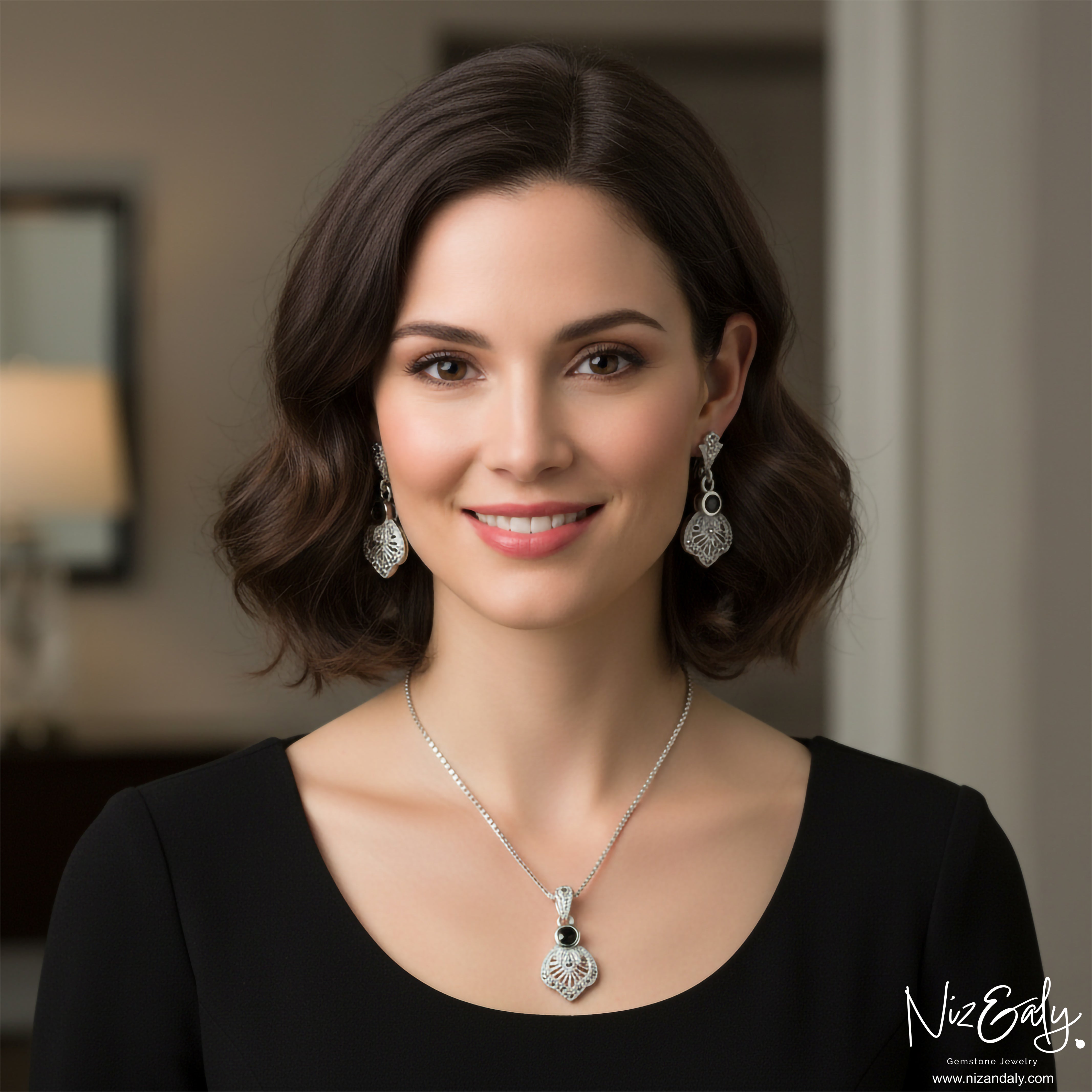 Niz & Aly sterling silver and black agate pendant necklace and earring set worn by a woman with a vintage star motif.
