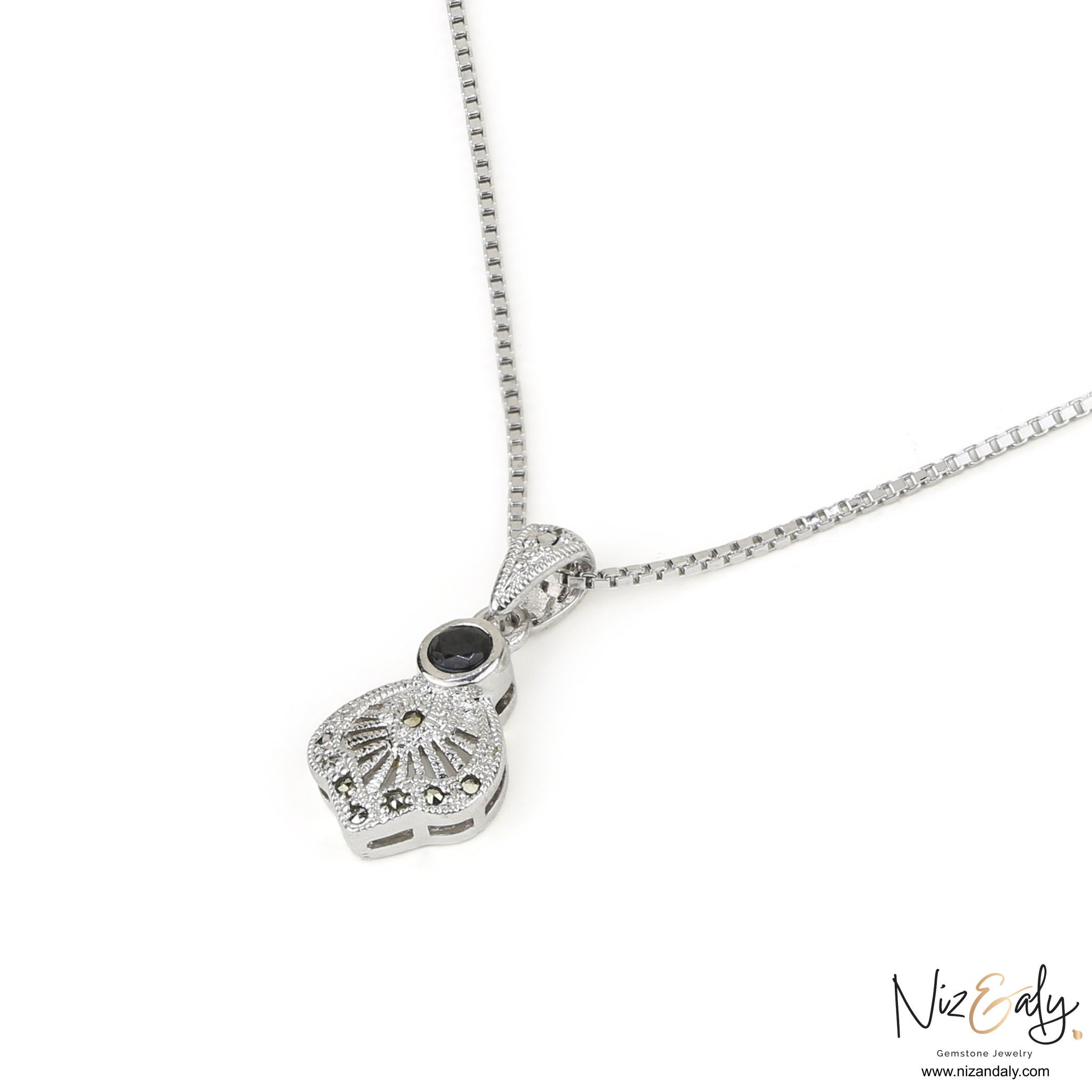 Niz & Aly sterling silver pendant featuring a black agate stone and vintage star motif on a delicate box chain