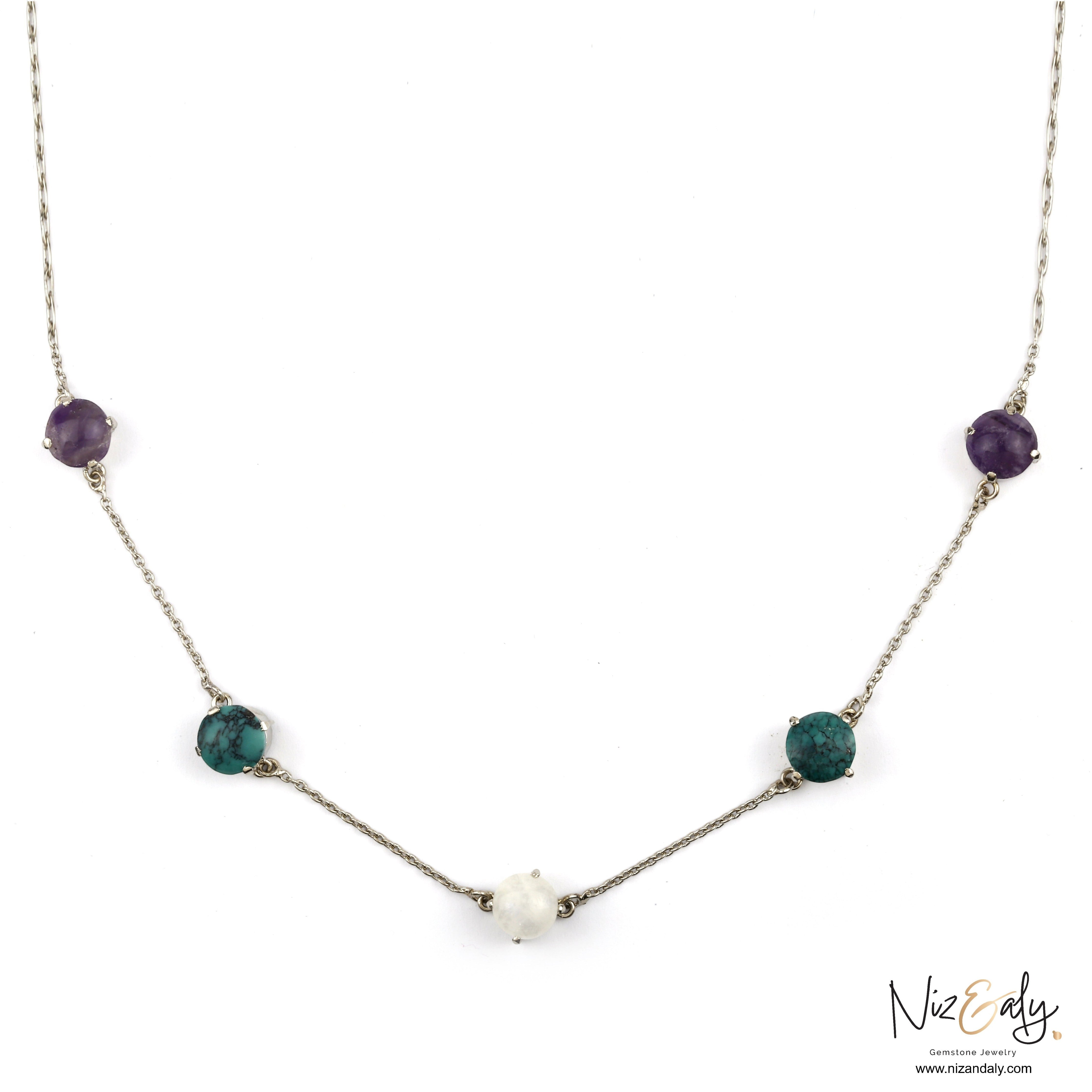 Niz & Aly sterling silver necklace featuring amethyst, turquoise, and milky quartz stones on a delicate chain.