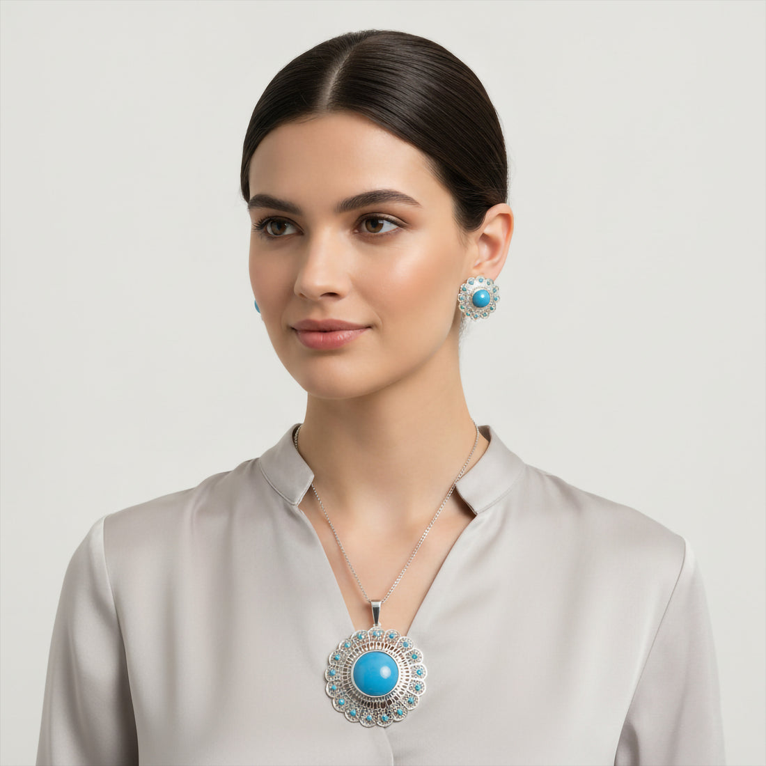 Niz & Aly turquoise jewelry full set featuring a necklace, earrings, and bracelet with vibrant turquoise stones.