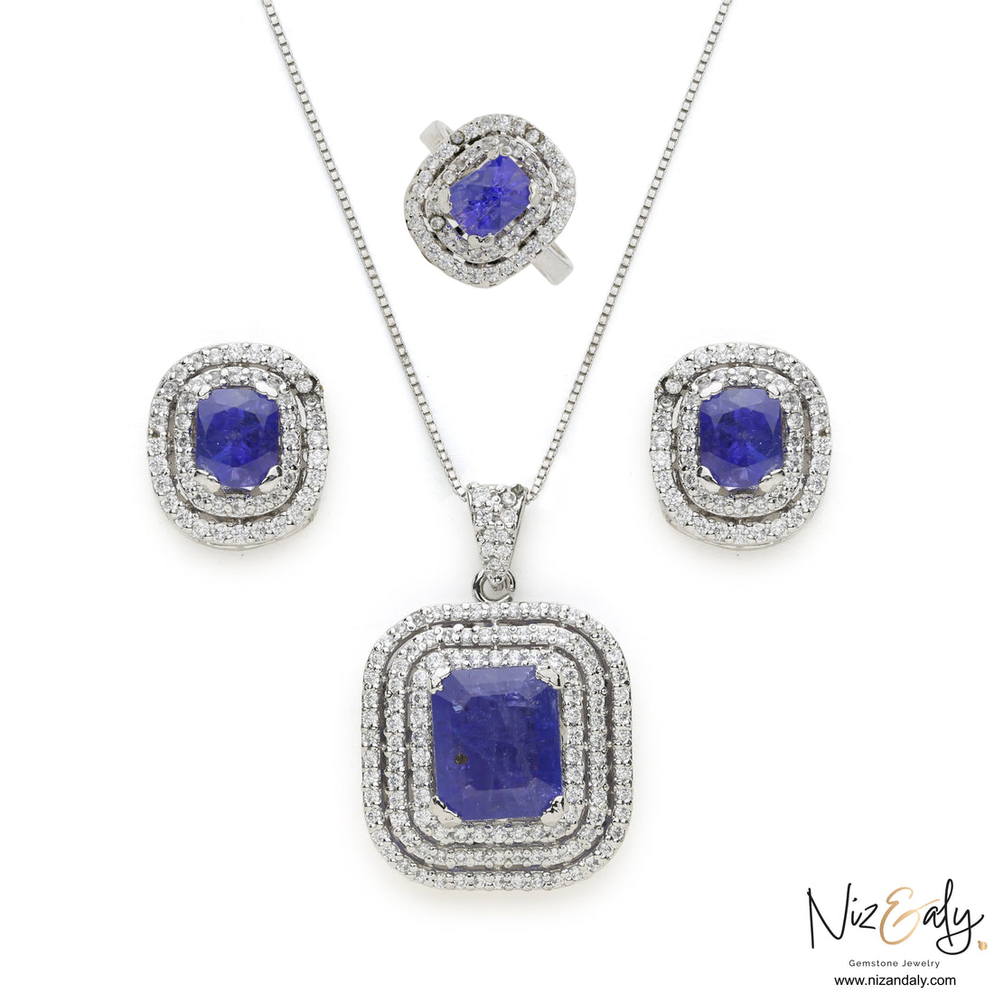 Niz & Aly lavender blue tanzanite jewelry set featuring a pendant, earrings, and ring in sterling silver with halos.