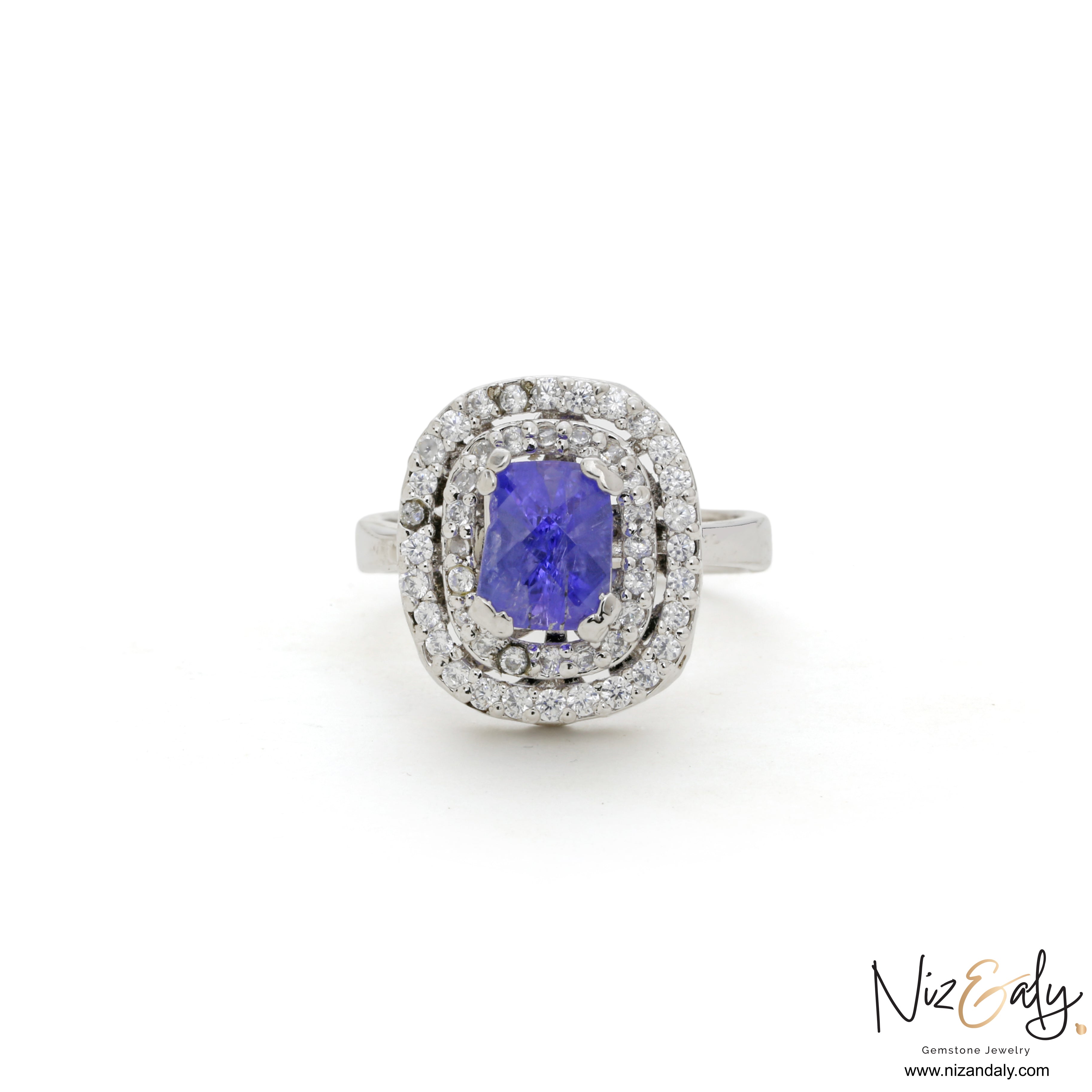 Niz & Aly lavender blue tanzanite ring in sterling silver with a double halo of sparkling white accent stones