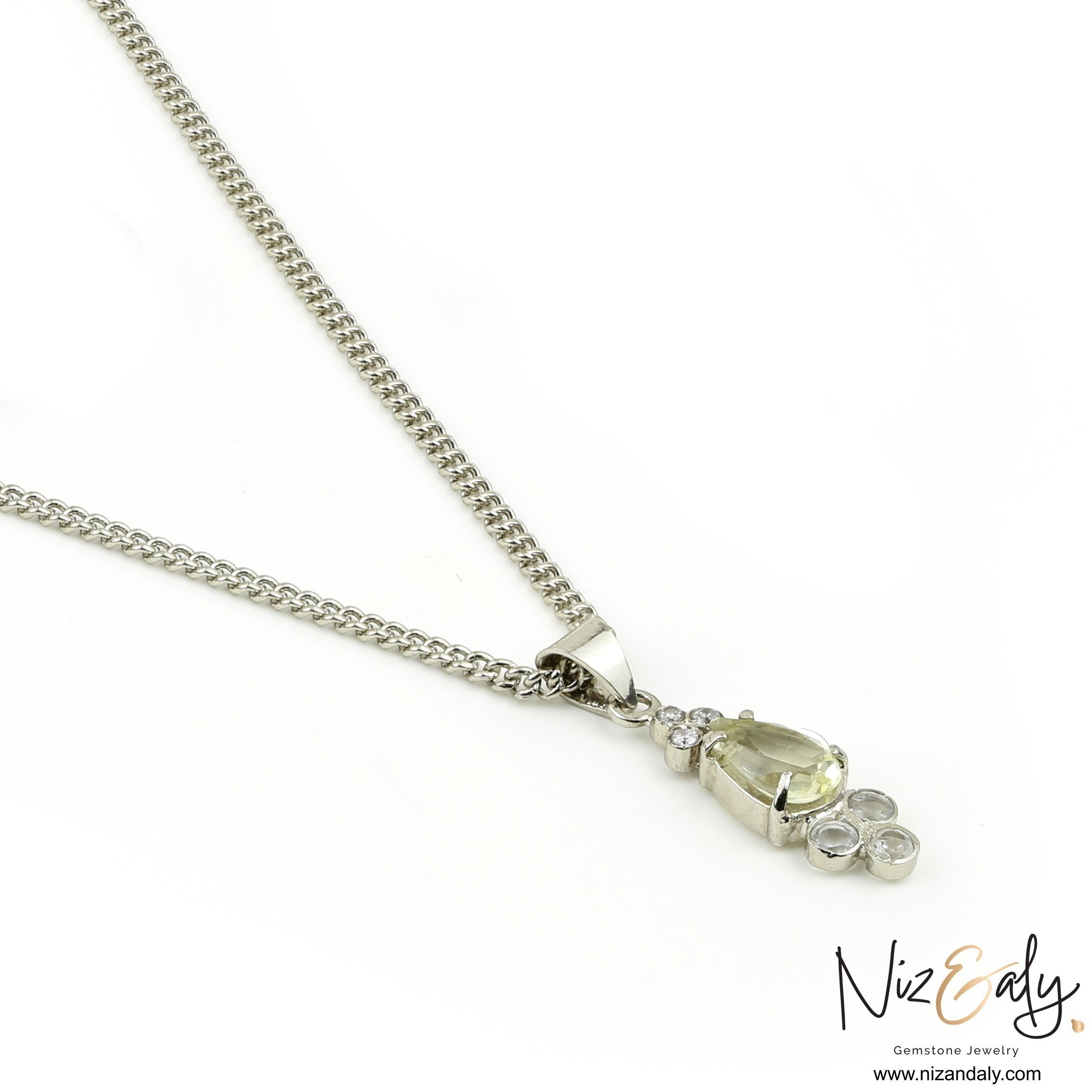 Niz & Aly Silver Moonlight teardrop clear quartz pendant necklace with silver chain on a white background