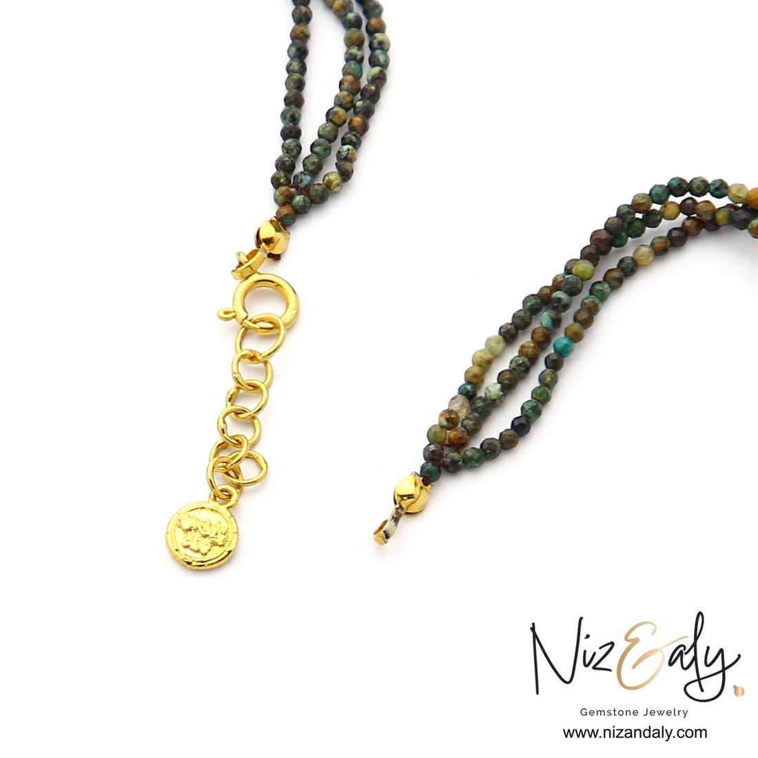Niz & Aly triple strand necklace featuring earth-toned faceted gemstone beads and a gold-toned adjustable clasp.