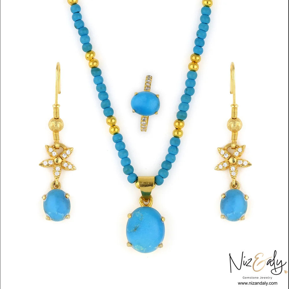 Niz & Aly turquoise gemstone jewelry set featuring a beaded necklace, floral drop earrings, and a matching ring.