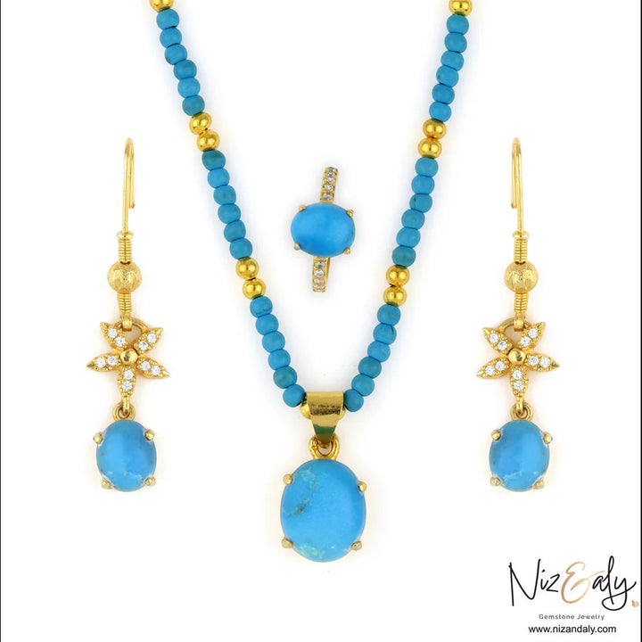 Niz & Aly turquoise gemstone jewelry set featuring a beaded necklace, floral drop earrings, and a matching ring.