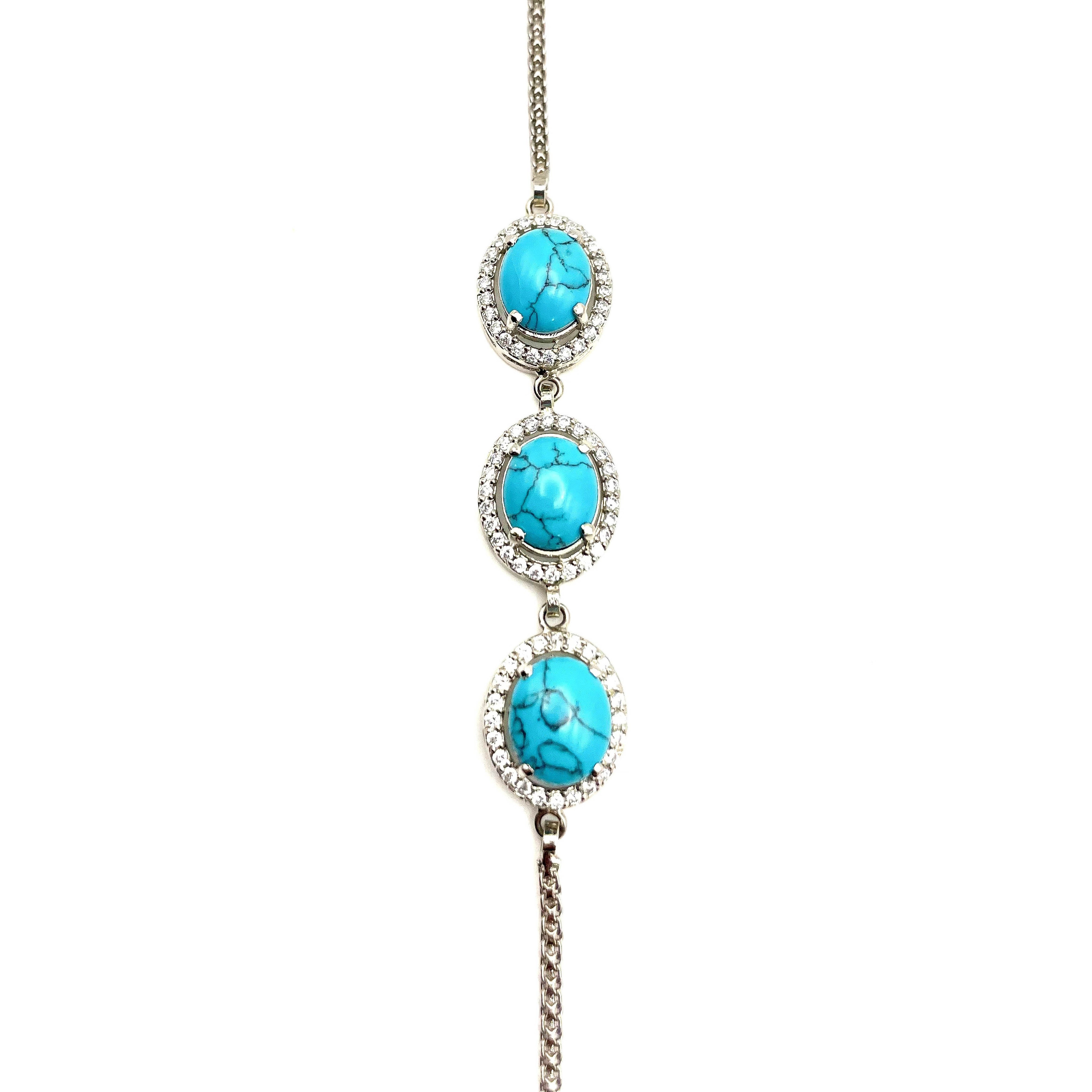 Niz & Aly turquoise blue howlite bracelet featuring three oval stones set in silver with sparkling crystal accents.