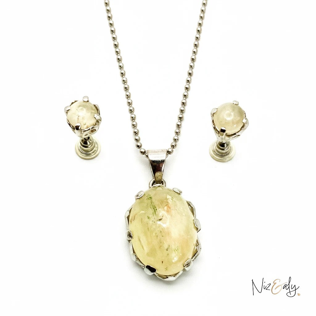 Niz & Aly natural untreated citrine locket pendant on a silver chain with matching stud earrings