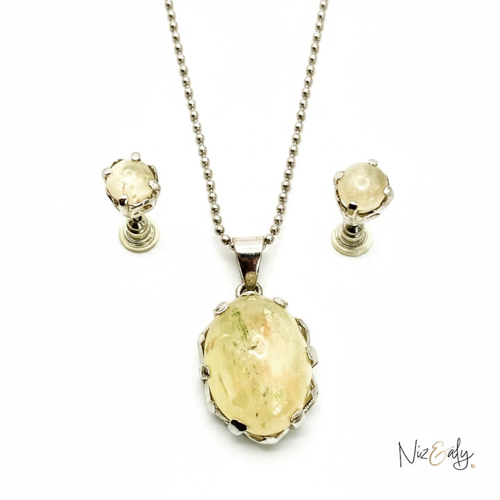 Niz & Aly natural untreated citrine locket pendant on a silver chain with matching stud earrings