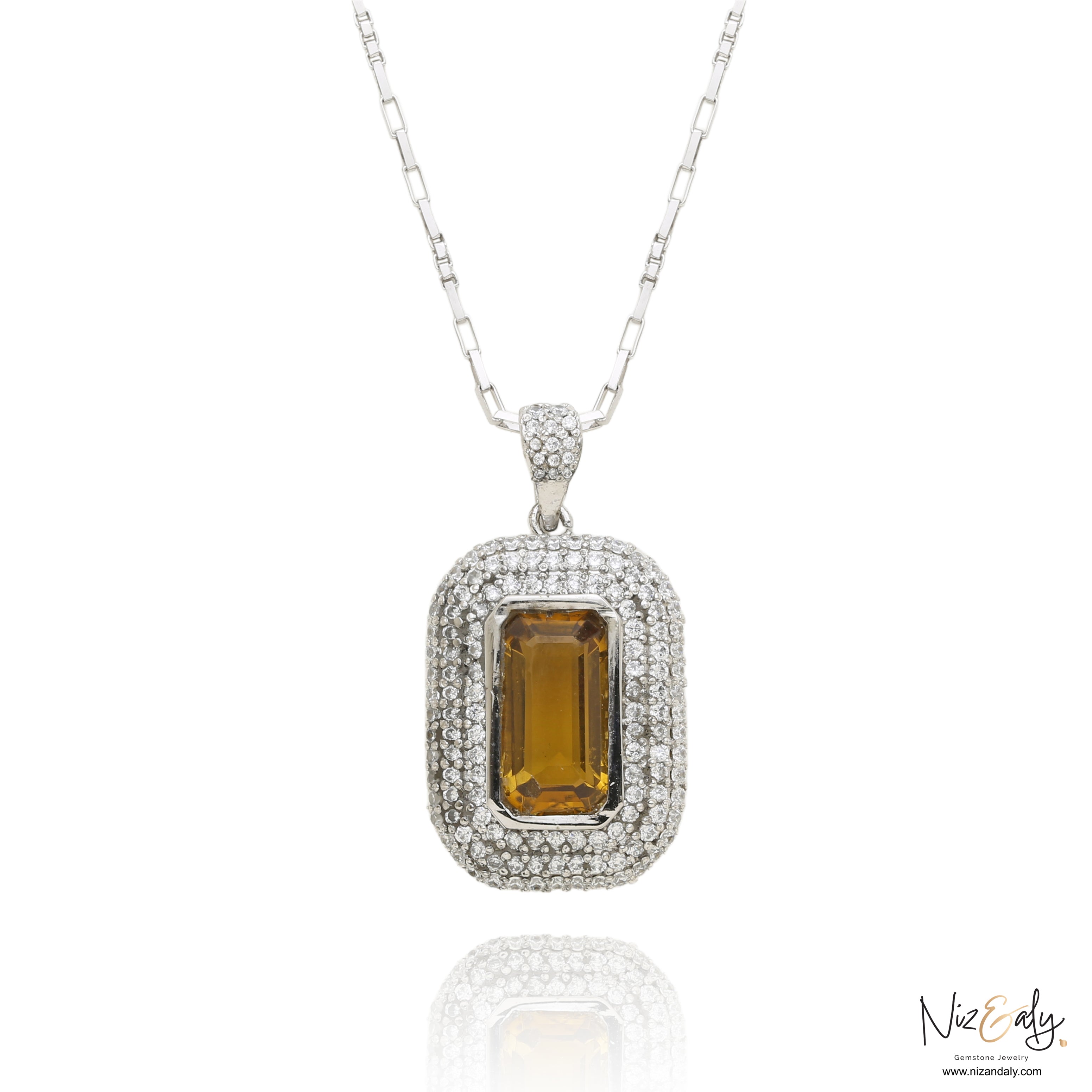 Niz & Aly yellow amethyst pendant necklace featuring an emerald-cut gemstone surrounded by a halo of white diamonds.
