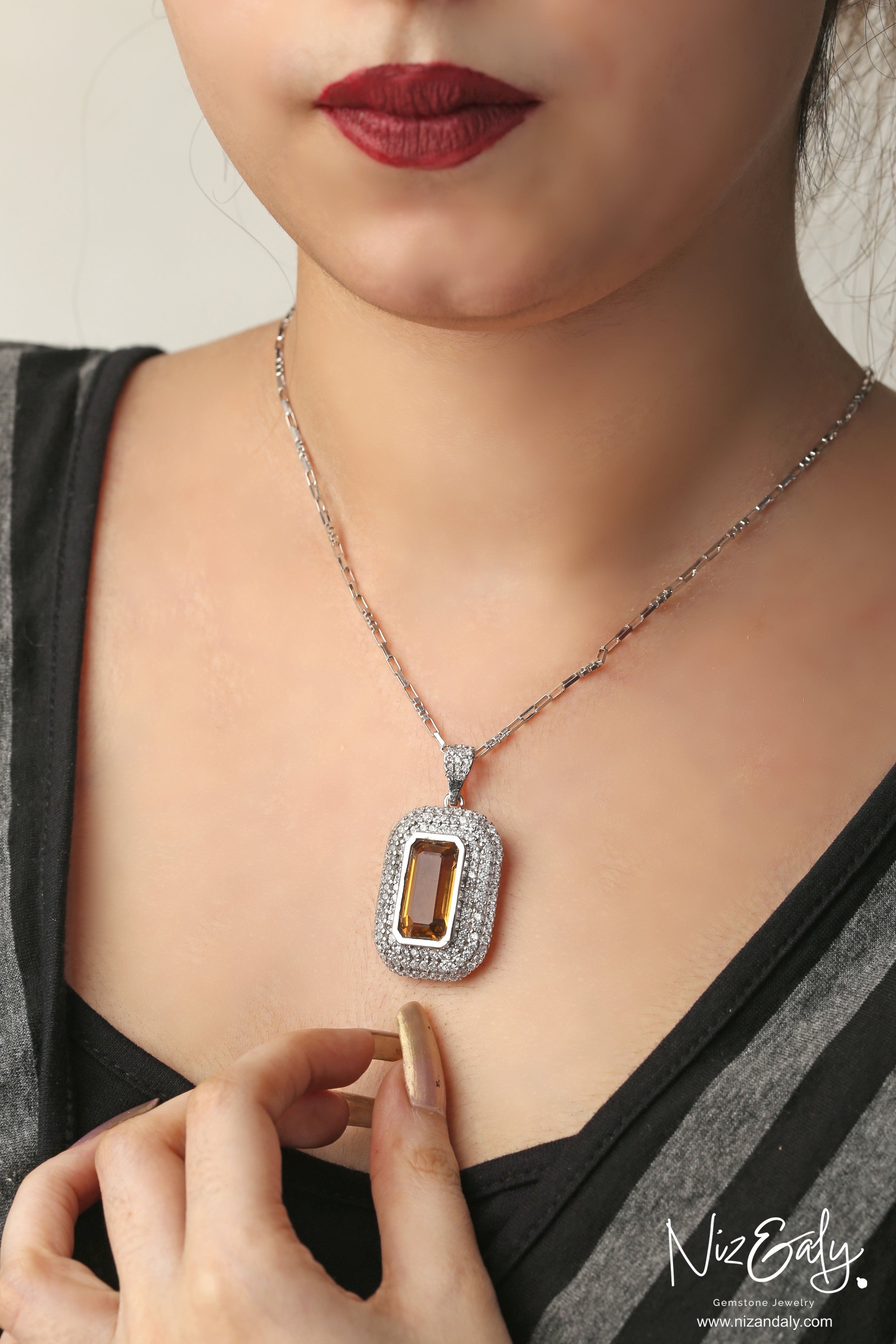 Niz & Aly yellow amethyst pendant necklace featuring a rectangular gemstone surrounded by sparkling white crystals