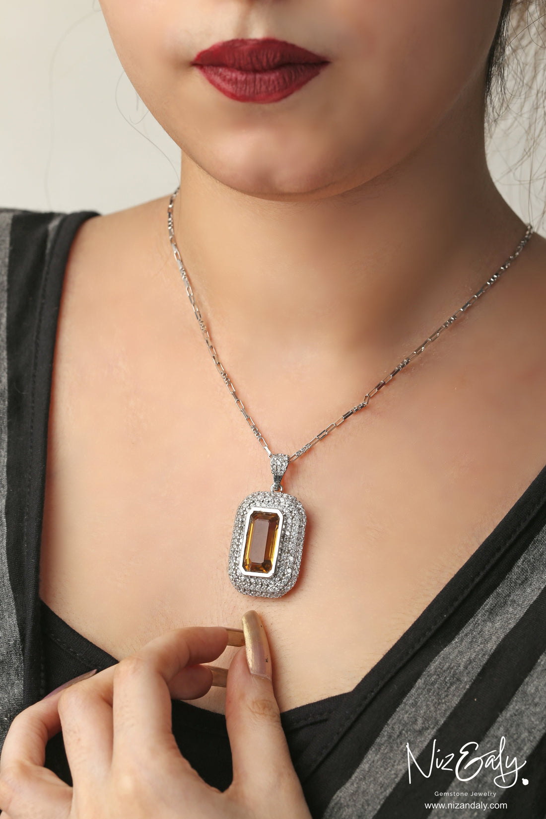 Niz & Aly yellow amethyst pendant necklace featuring a rectangular gemstone surrounded by sparkling white crystals