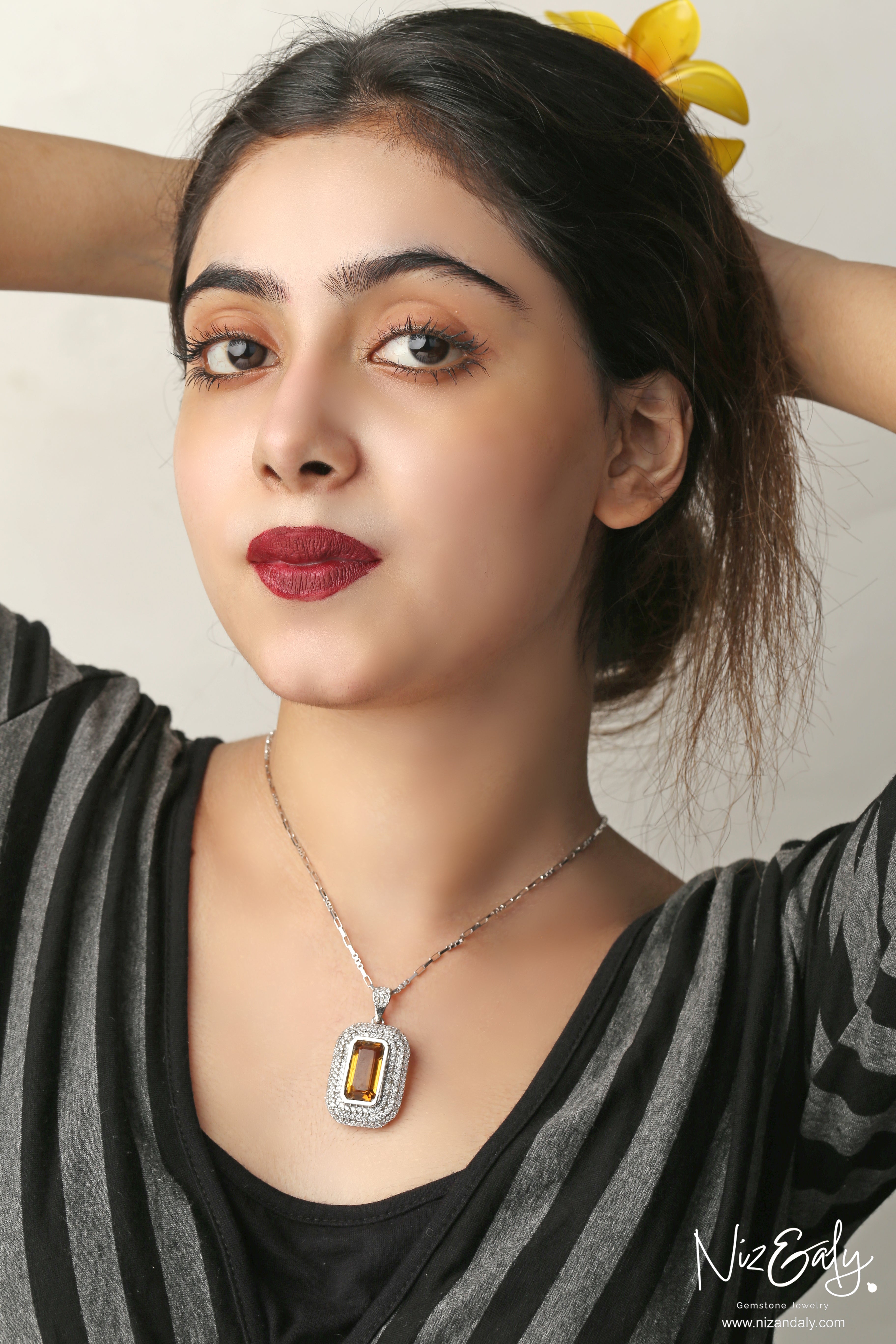 Niz & Aly yellow amethyst pendant necklace featuring a rectangular gemstone surrounded by sparkling white crystals