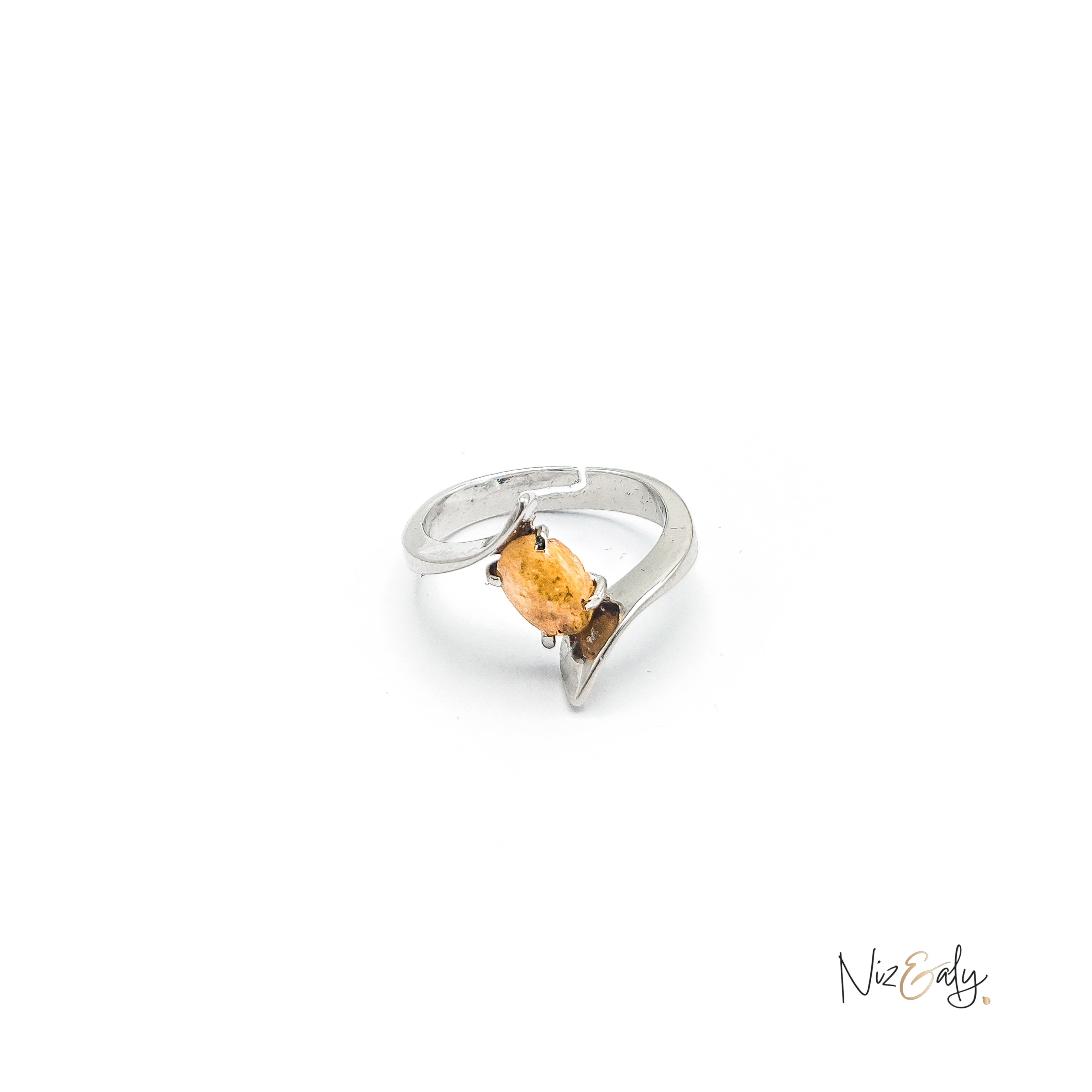 Niz & Aly yellow citrine ring featuring an oval gemstone set on a modern, adjustable silver-tone open-bypass band.