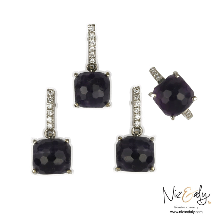 Niz & Aly square dark amethyst pendant and earring set with diamond-accented silver settings on a white background.