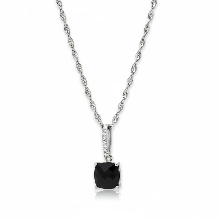 Niz & Aly silver rope chain necklace featuring a square black crystal pendant with small accent stones