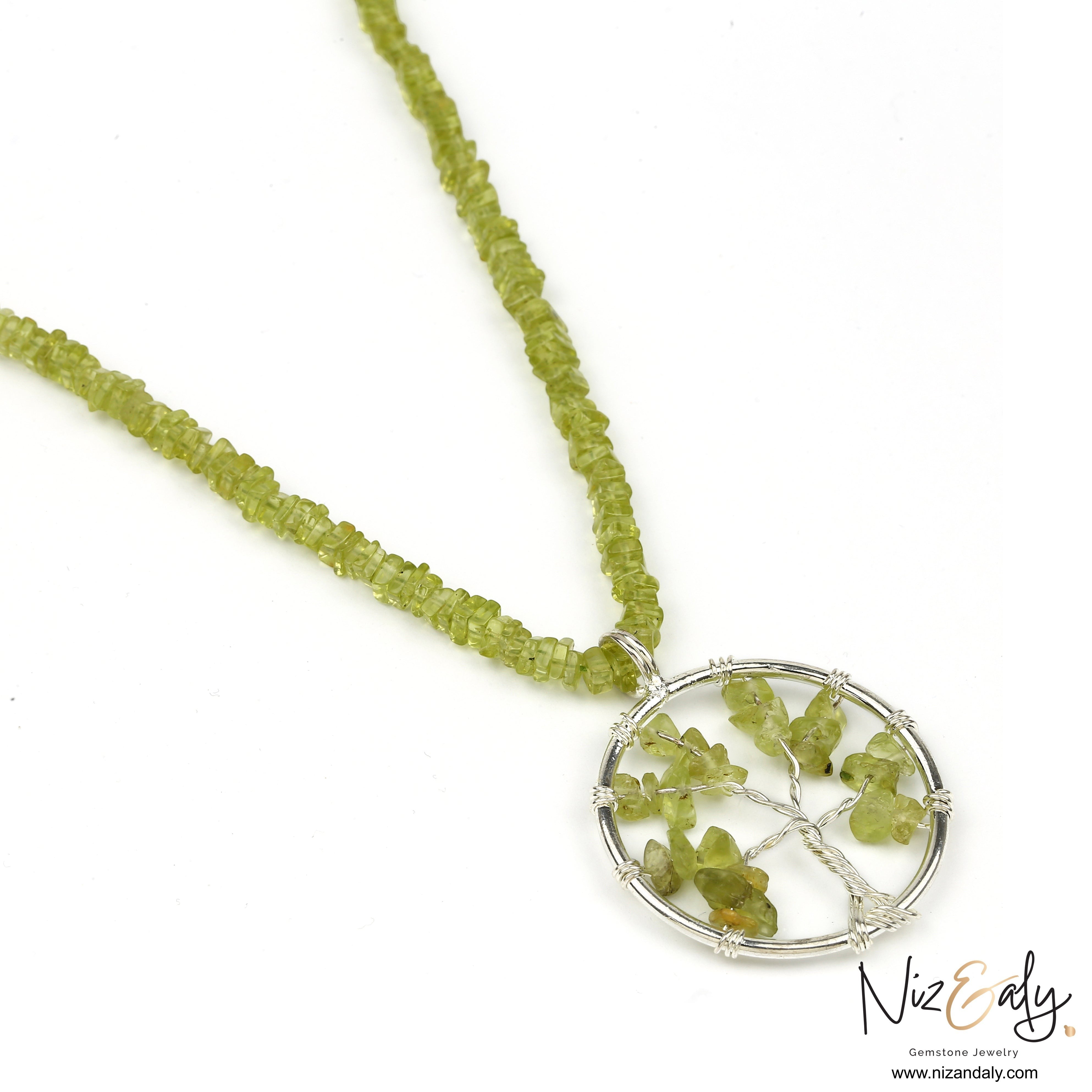 Niz & Aly peridot tree pendant necklace featuring green heishi-cut gemstone beads on a 14-inch choker chain.