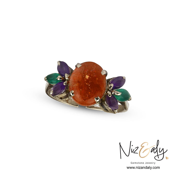 Niz & Aly adjustable 925 sterling silver ring featuring a central sunstone with amethyst and chrysoprase accents.