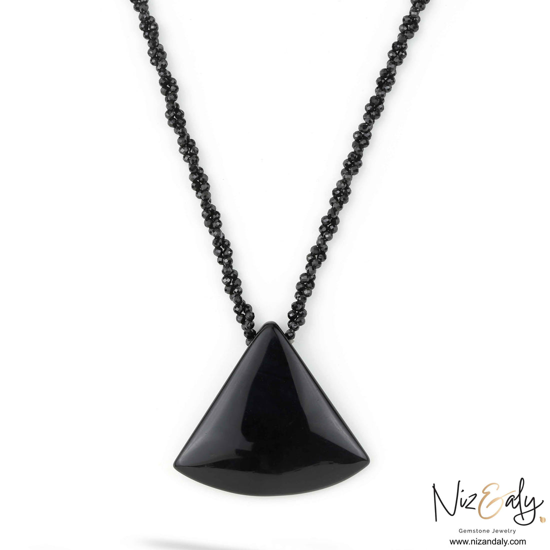 Niz & Aly Agate Eclipse necklace featuring a smooth triangular black agate pendant on a beaded black onyx chain.