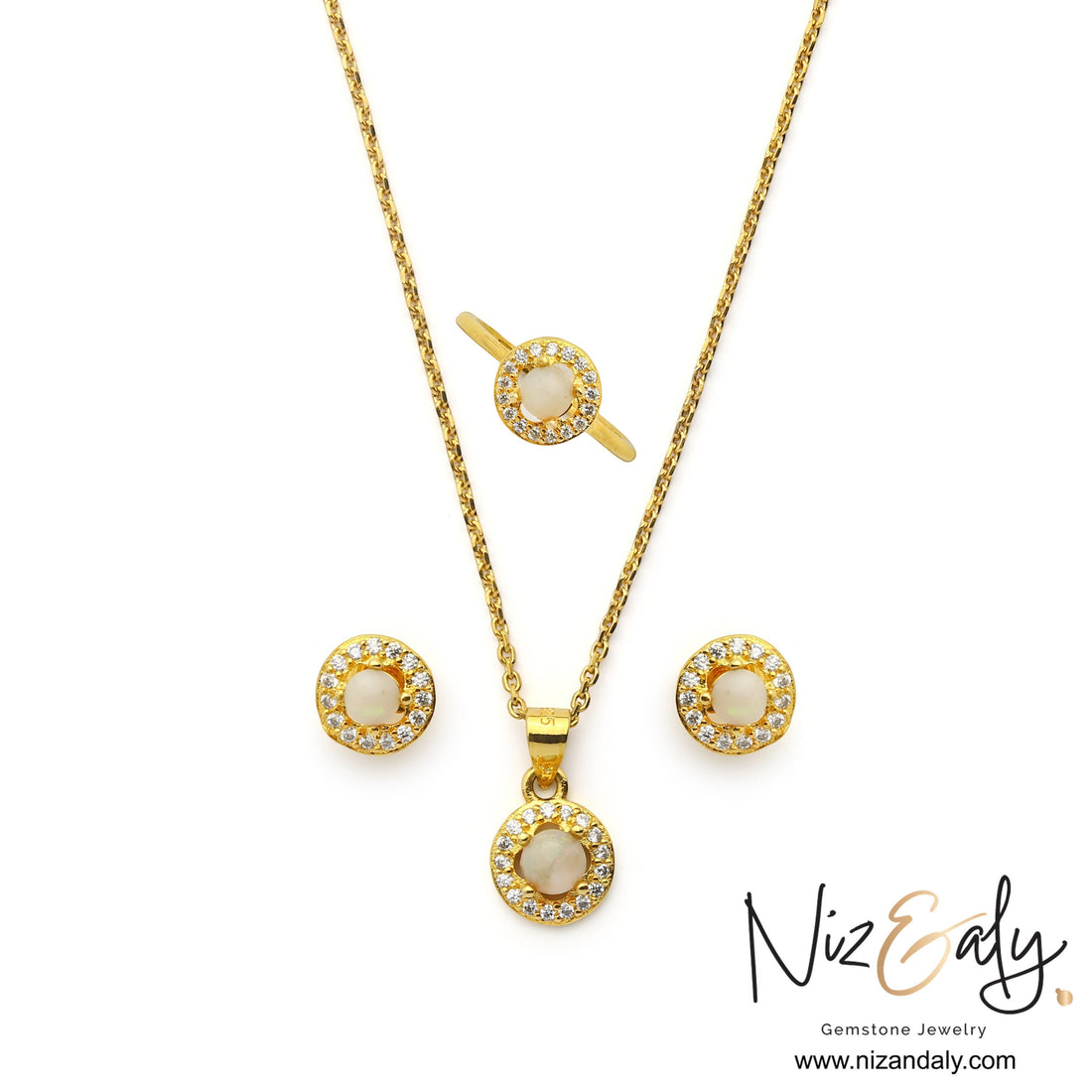 Niz & Aly Opalea jewelry set featuring a round white Australian opal pendant, stud earrings, and ring with halo settings.