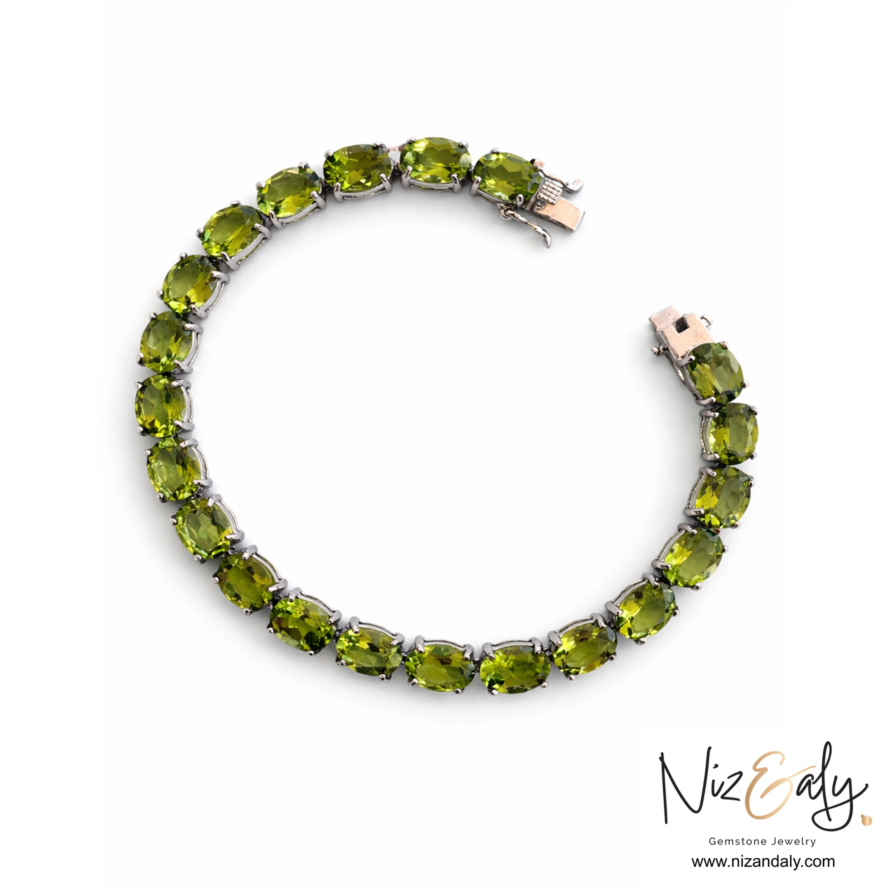 Natural peridot tennis bracelet in rhodium-plated sterling silver