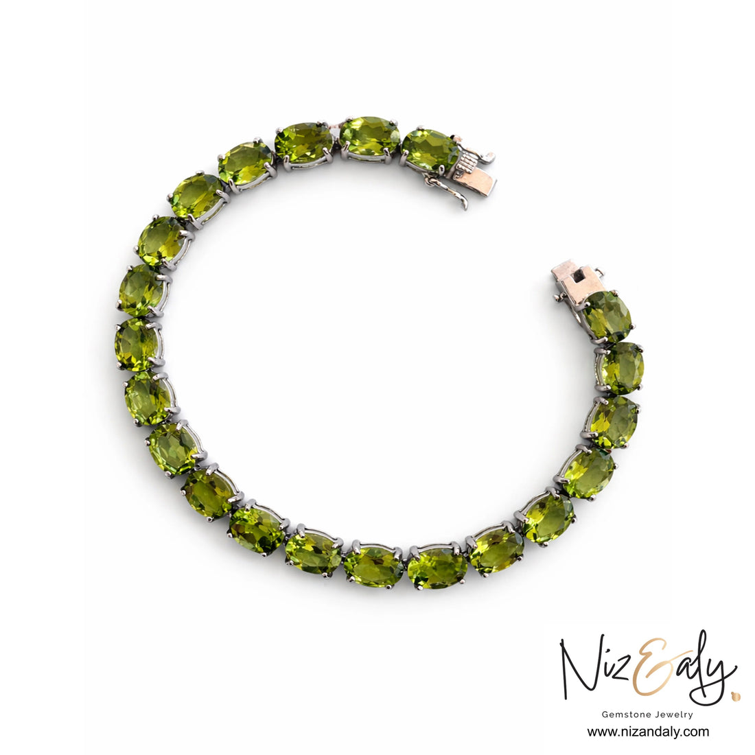 Natural peridot tennis bracelet in rhodium-plated sterling silver