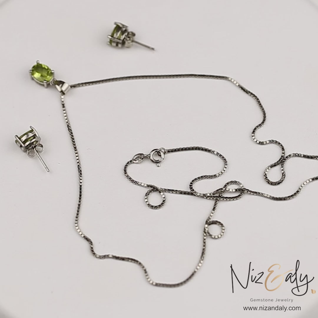 Oval American Peridot Solitaire Pendant Set.
