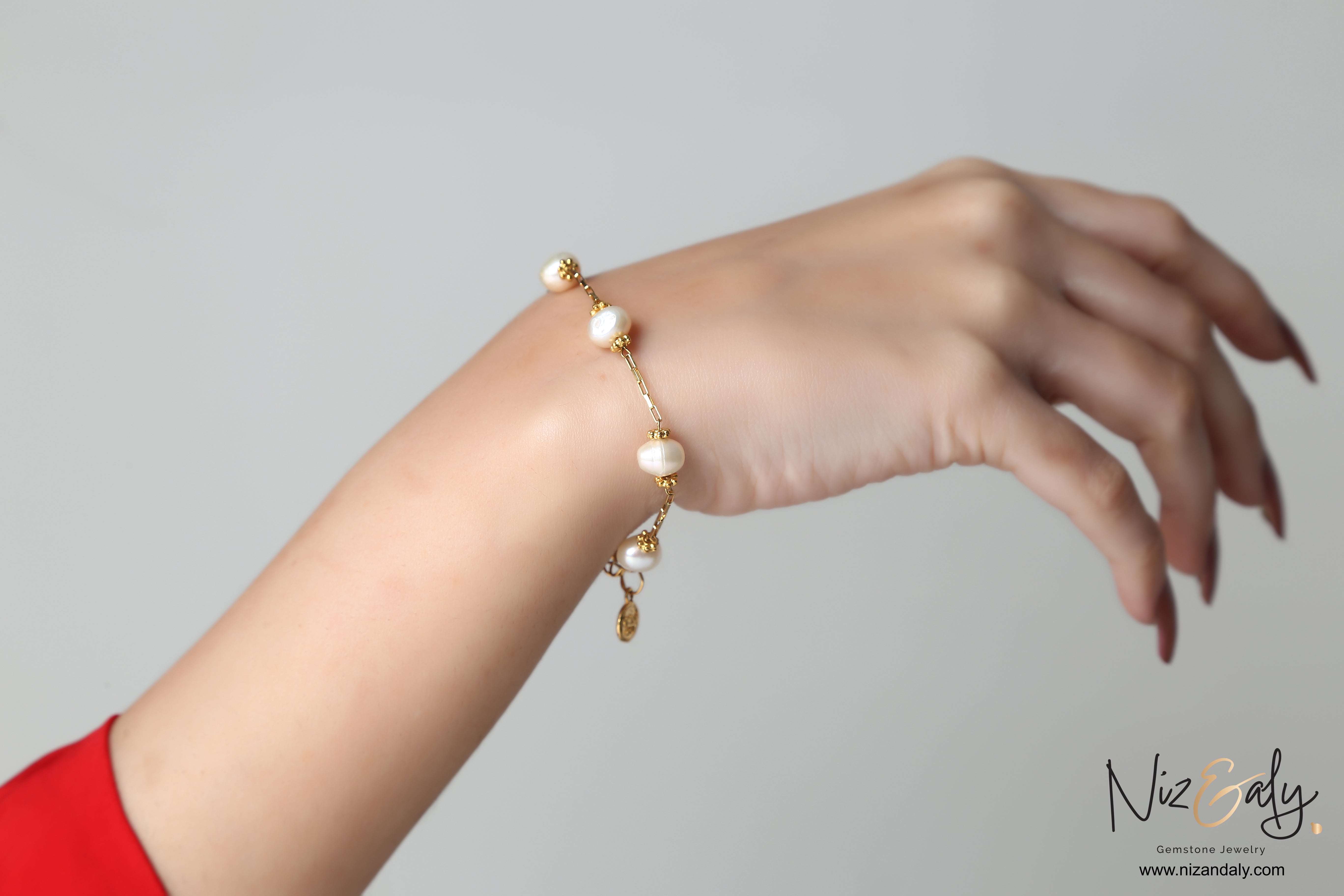 Delicate sterling silver pearl bracelet with gold plating